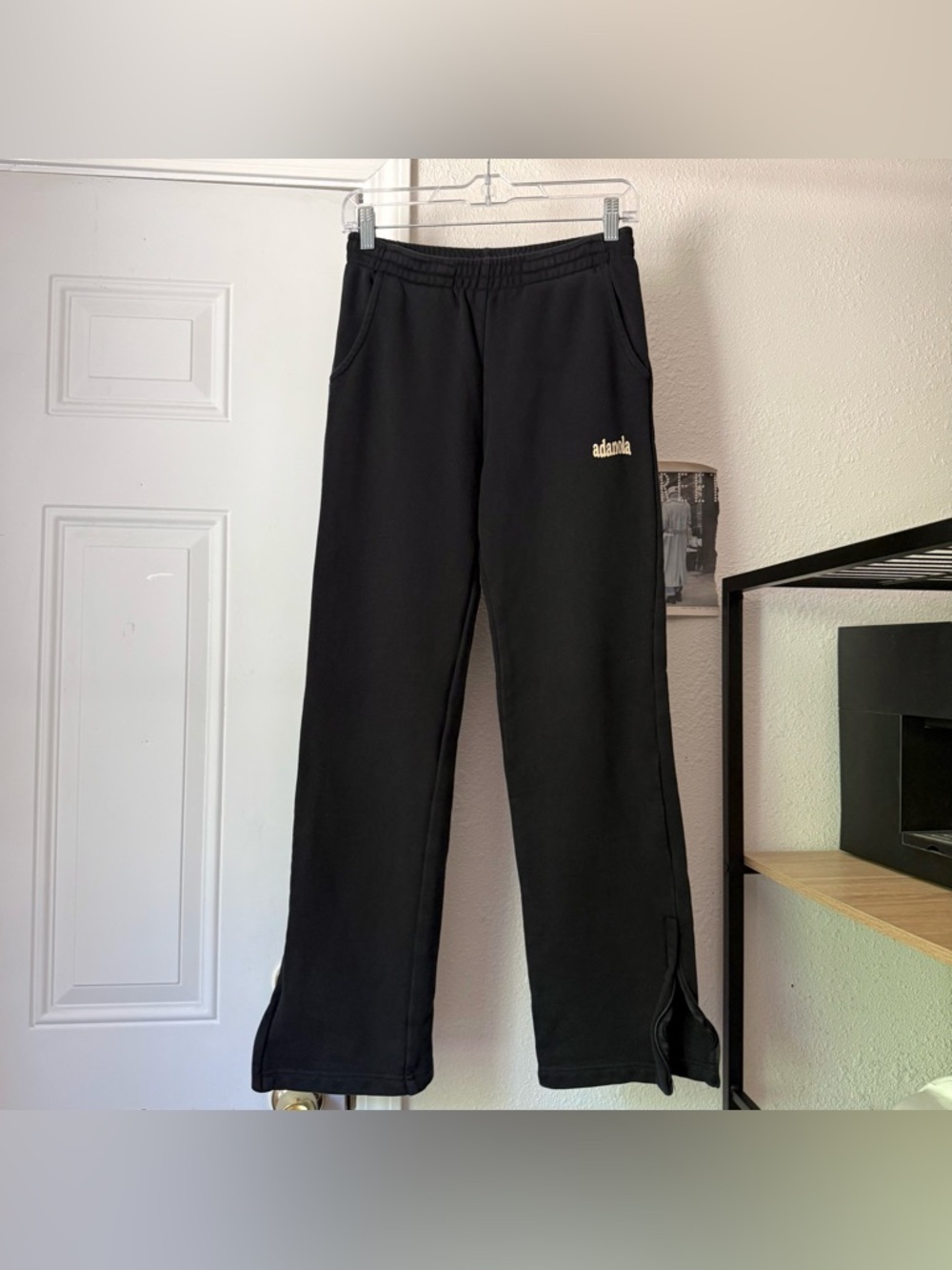 ADANOLA black cotton terry knit logo split hem straight leg sweat pants